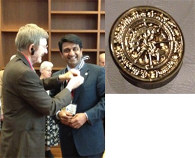Dr Hosalkar receiving the Presidential Pin