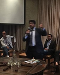 Dr Hosalkar discussing a debate point with the Faculty members during the ‘Post-operative