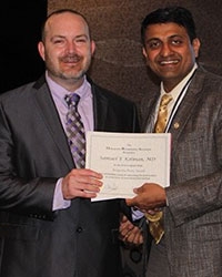 Dr Keith Baldwin receiving the ‘Jacquelin Perry’ award (on behalf of Samuel Kolman)