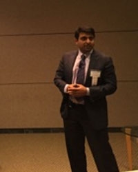 Legend: Dr Harish Hosalkar (President of SAPI) answering questions with other panelists including